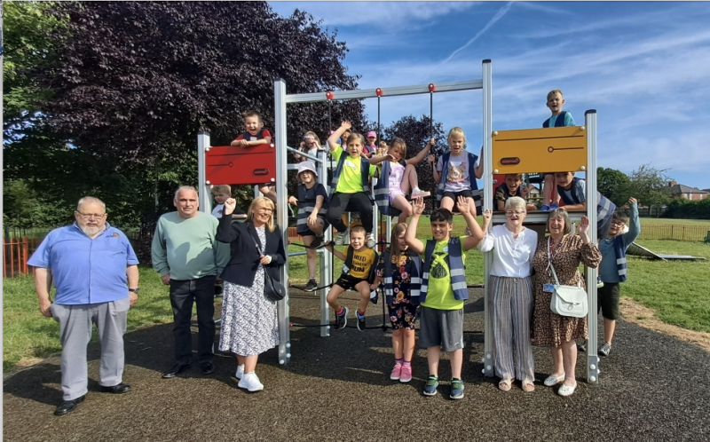 Members of Royston Green Spaces Group, cabinet spokesperson for public health and communities, Coun Wendy Cain, with children from the Cool Kids R Us summer holiday programme.