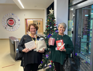 Belinda Price and Nicola Thomson Dewey with the OPI donations.