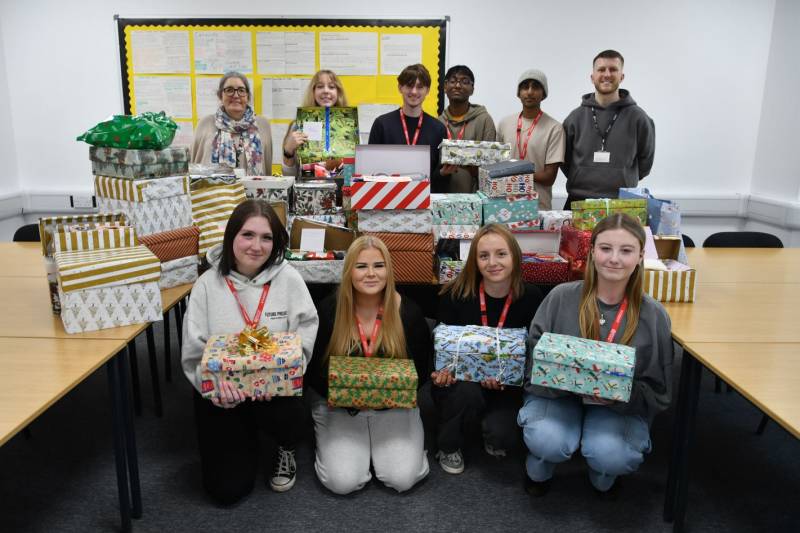 Level 3 Health and Social Care students with the shoeboxes.