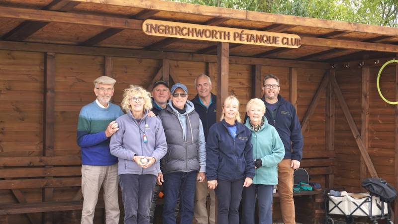 Members of Ingbirchworth Petanque Club with their new shelter.