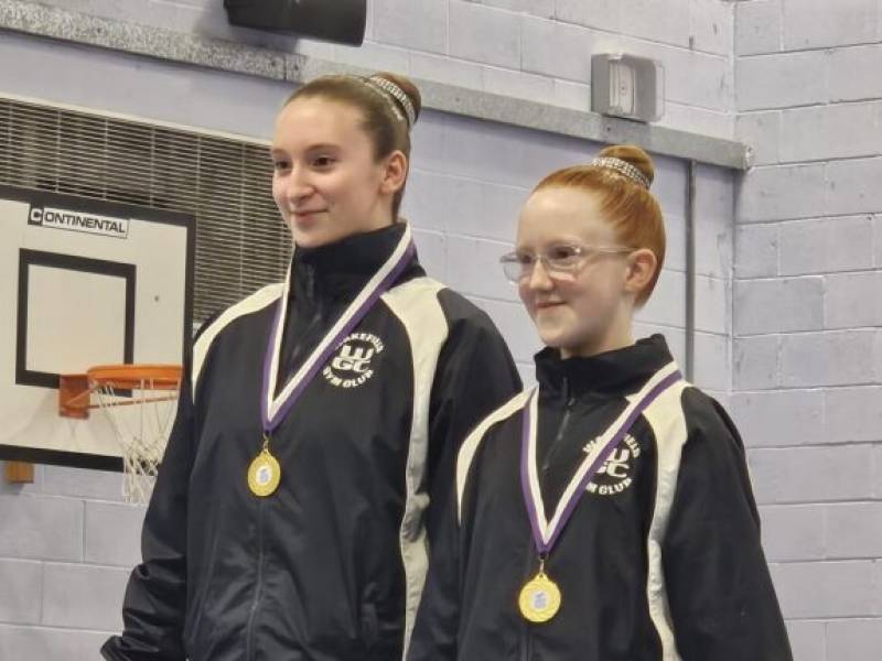 Ellie Hardy, left, and Jessica Wilson with their gold medals.