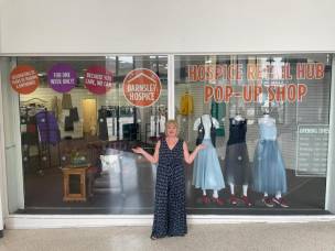 Barnsley Hospice Retail Hub sales lead, Victoria Sanderson in front of the Hospice Retail Hub pop-up shop in the Alhambra Shopping Centre.