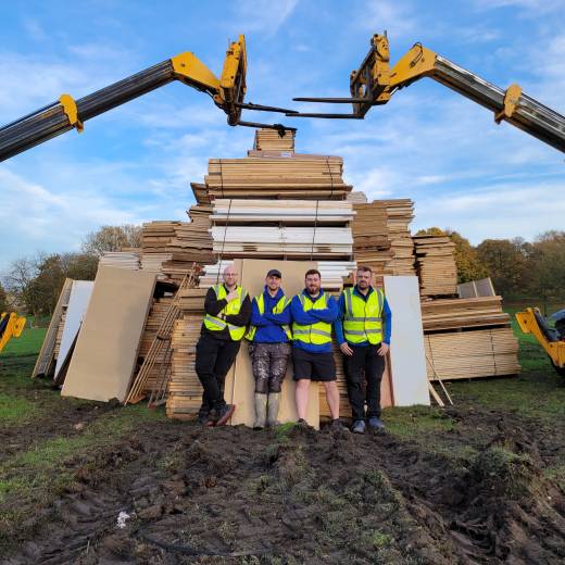 Barnsley Round Table volunteers with the completed bonfire