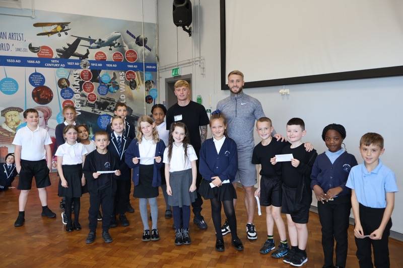 Main image for Barnsley players talk football and mental health on school visit