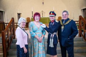 Main image for 'Surreal' evening as choir founder Cheryl  receives BEM