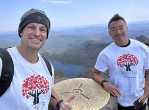 Steve Iveson and Shiro Ando during  an earlier fundraiser tackling the Three Peaks Challenge.